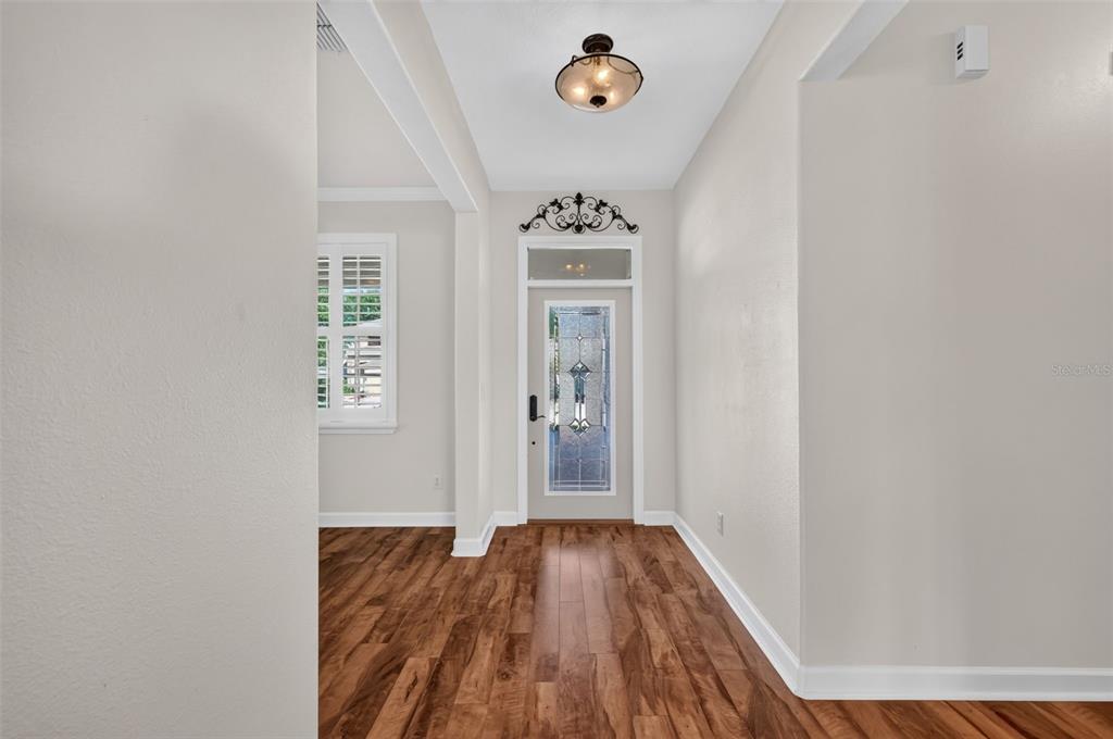 The foyer is 4'9' x 7' with space to decorate next to the leaded glass door ~