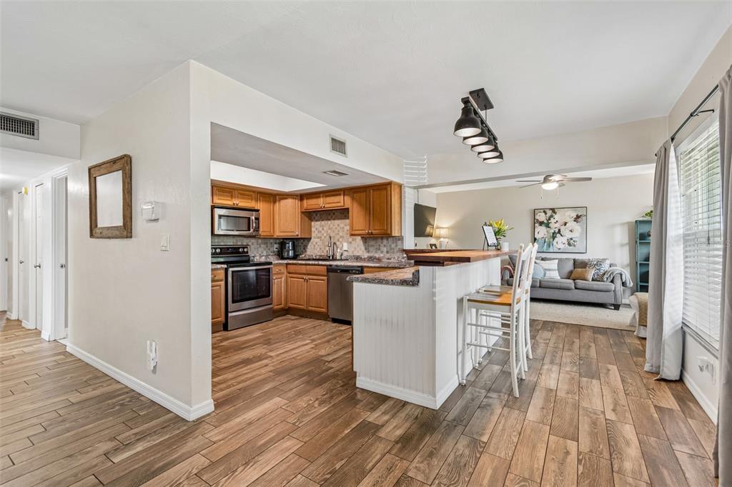 An open layout connects the kitchen and living spaces for easy everyday living.