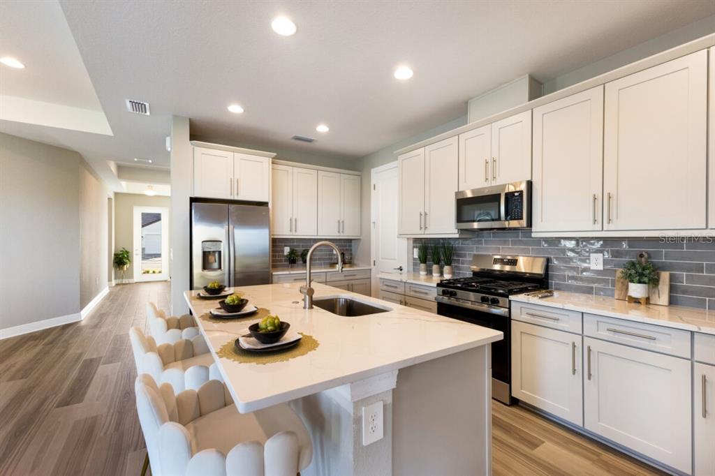Kitchen-Photo description represents the model home of same floor plan.