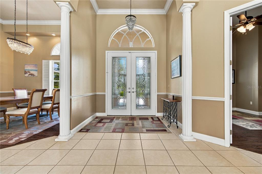 Welcoming entry opens to a spacious, light-filled interior