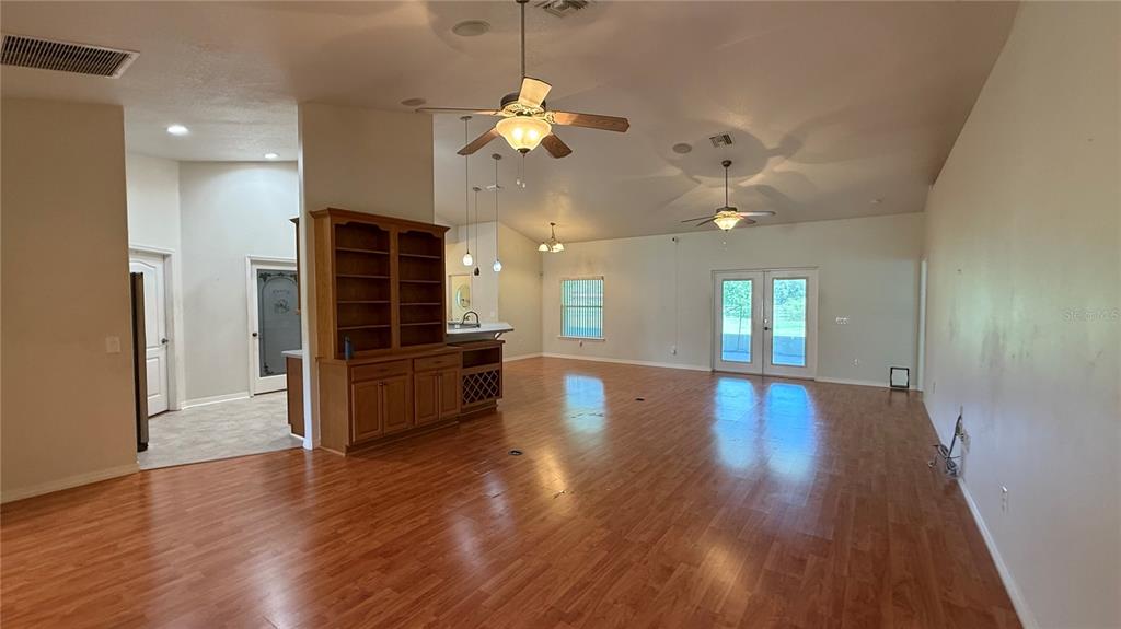 Opens to Lanai through French Doors