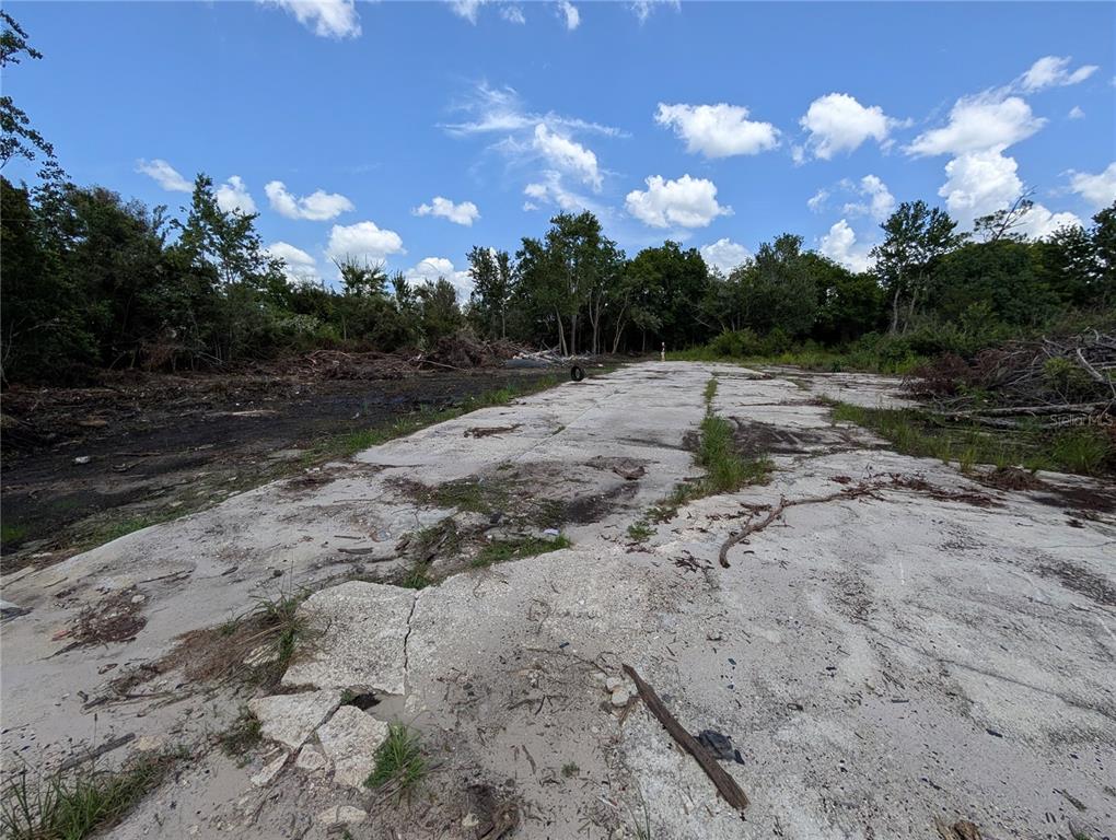 Odd concrete path to the property.