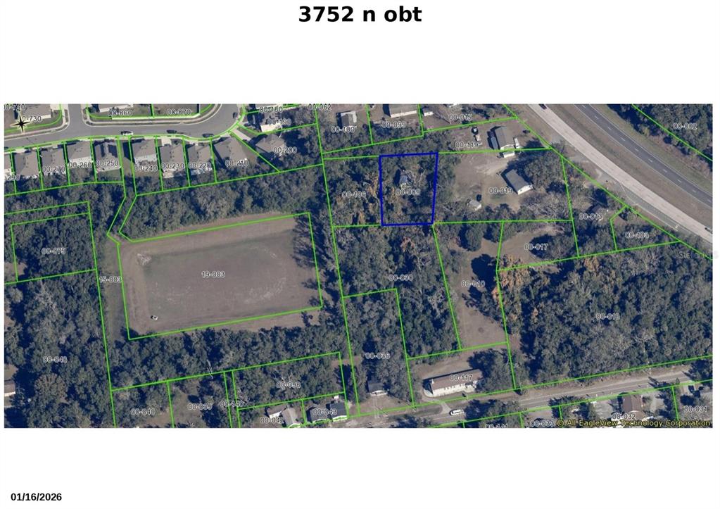 Main address with the old structure still on it. This parcel is .42 of an acre.