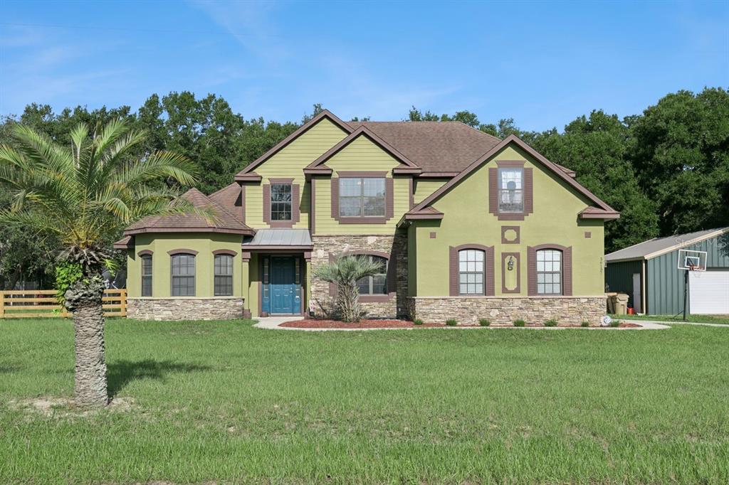 Spacious 5 Bedroom, 3 Bathroom, 2 Car Garage and Detached Garage Home on 1.68 Acre Lot