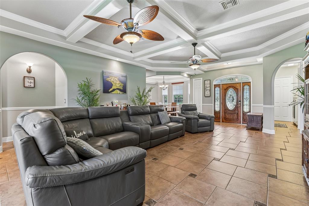 Open plan great room with high feature ceilings