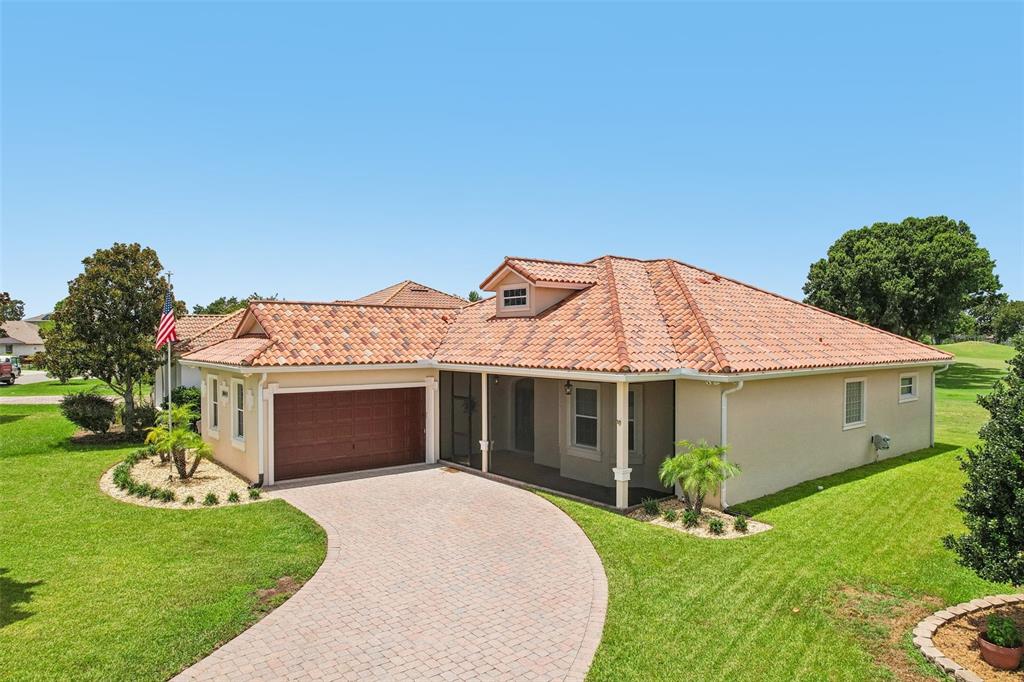 Beautifully upgraded home with screened in porch and views to front and rear
