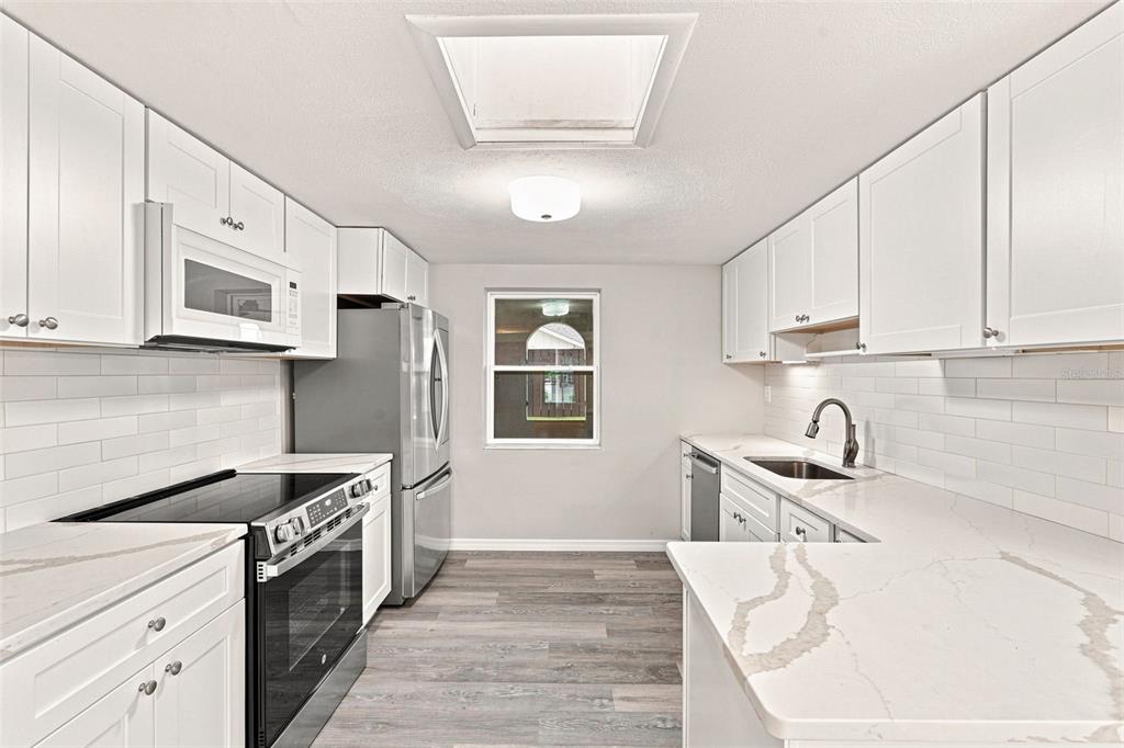 Bright Kitchen with Stylish Subway Tile Backsplash