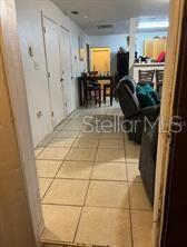 3 . Front Door toward Kitchen dining area and Back Door View