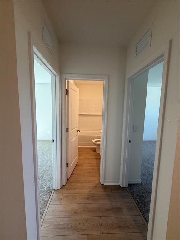 Hallway to guest bedrooms and bath