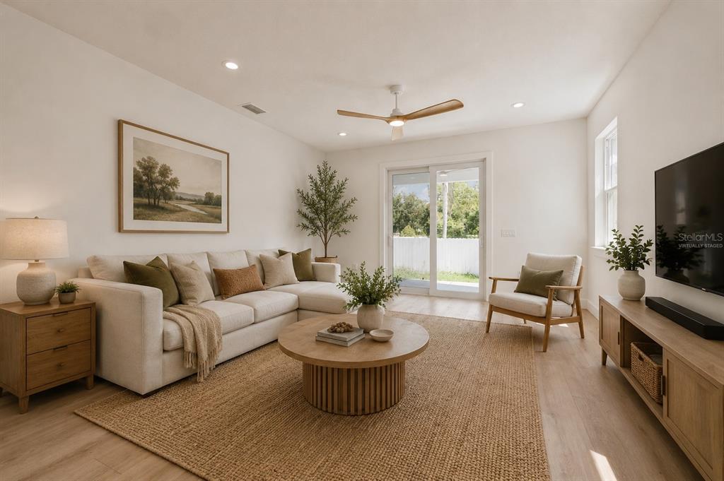 Living Room off of the kitchen  (Virtually Staged)