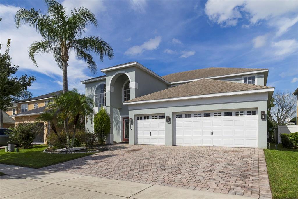 With a SCENIC POND VIEW from the front, attractive landscaping and a brick-paver driveway leading to the THREE-CAR GARAGE, this home makes a wonderful first impression.