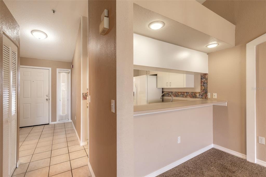 Property for sale at 407 BOUCHELLE DRIVE UNIT 303, NEW SMYRNA BEACH, FL, 32169
