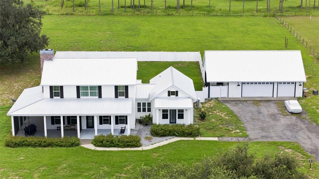 Aerial view showing privacy fenced rear portion
