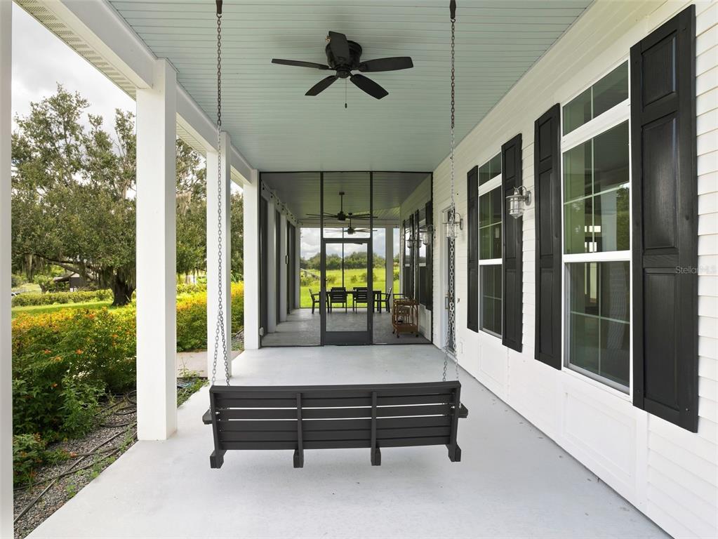 Covered front porch with swing