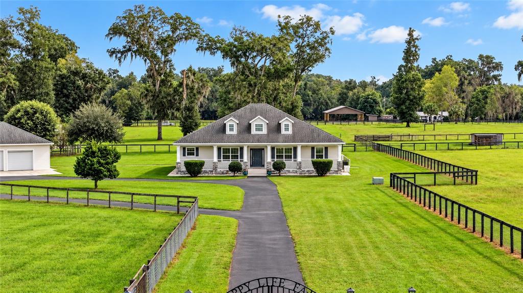 Custom-Built Farmhouse on 13.58 acres.