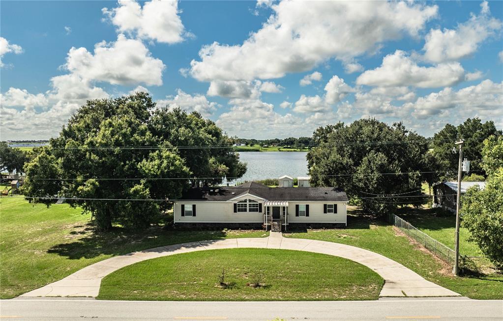 Front of house with view of Lake Walker