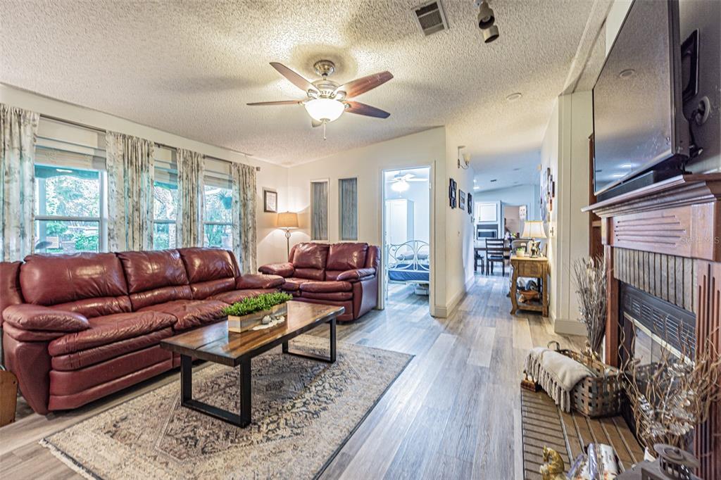 Wood burning fireplace is the spacious living room at the front of the home!