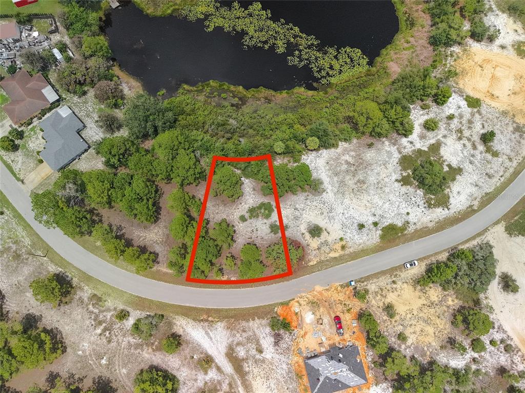 Check out this vacant lot on Lake Tina.