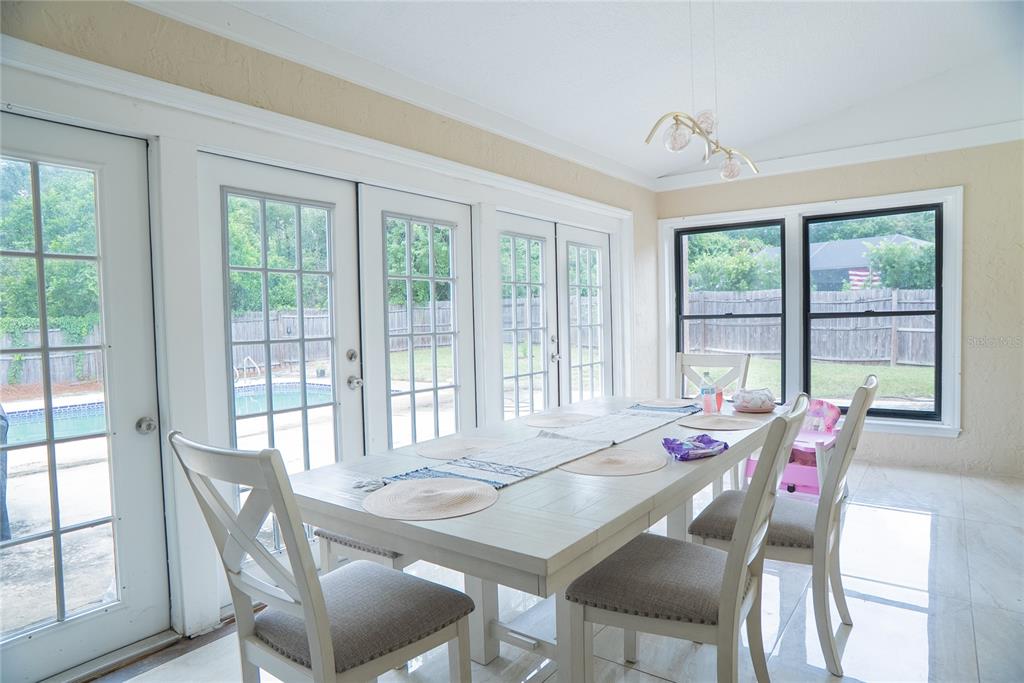 Dining room at 304 Shadow Oak Drive, a four-bedroom pool home for sale in Casselberry, Florida