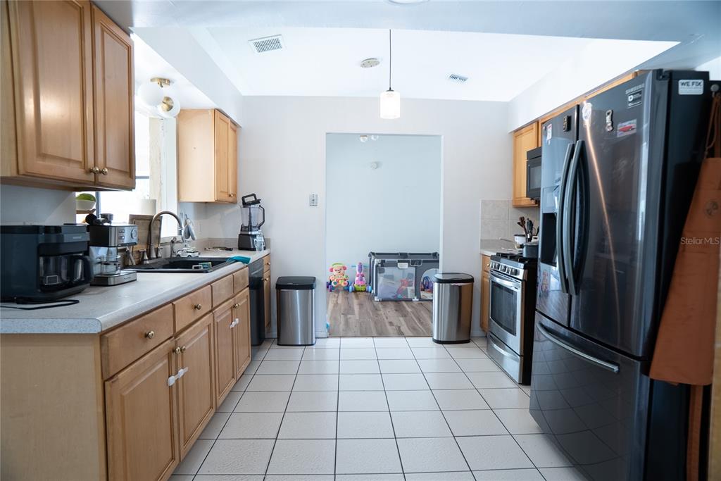 Kitchen at 304 Shadow Oak Drive, a four-bedroom pool home for sale in Casselberry, Florida