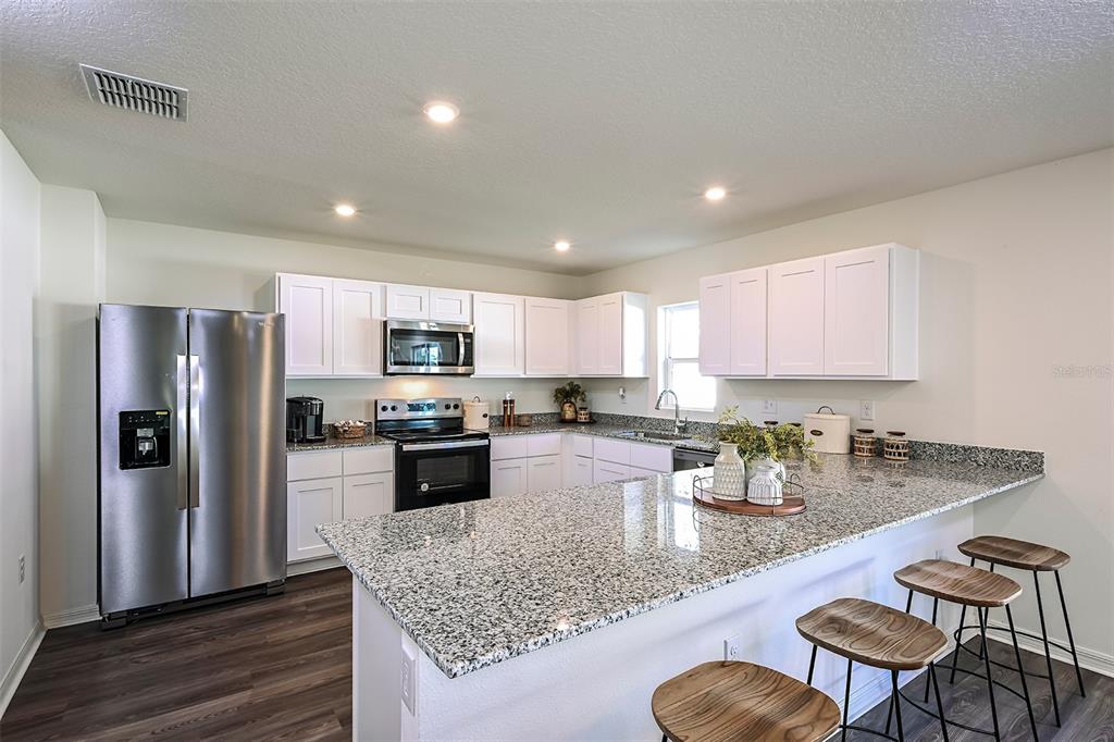 Property for sale at 704 OAK HAMMOCK WAY, AVON PARK, FL, 33825