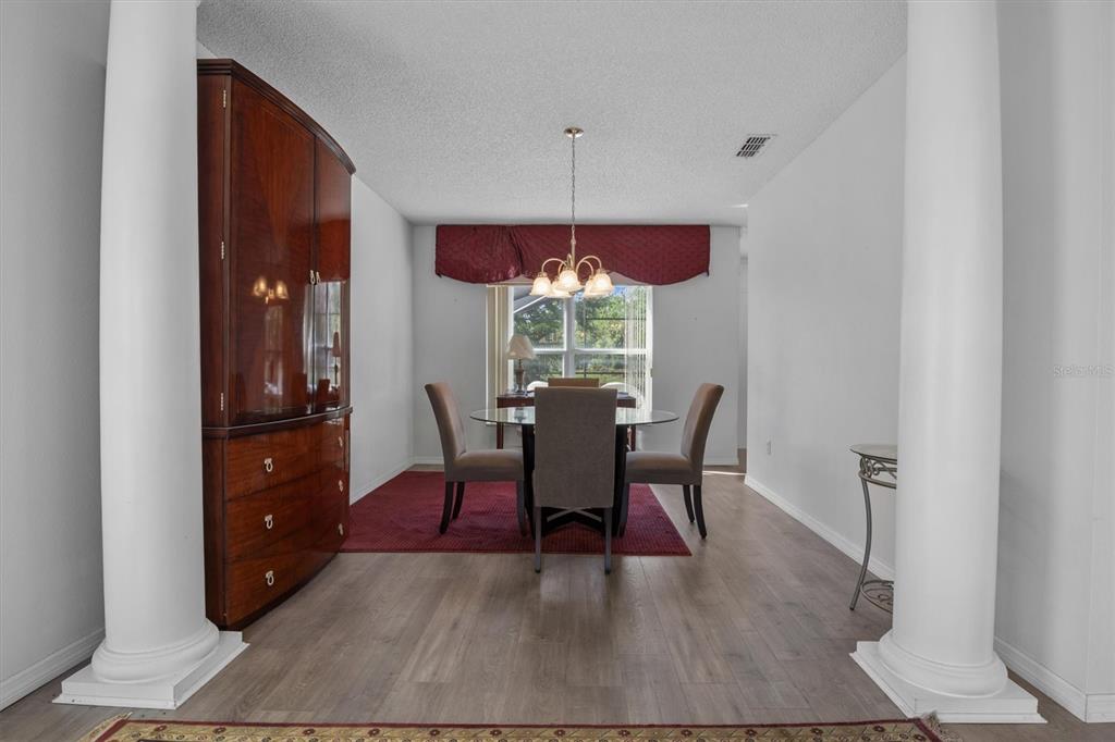 Formal dining room at the back of the home.