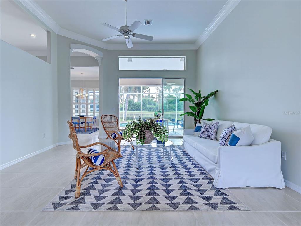 Wow! Wow! Wow!  Spectacular view greets you when you enter this special home. 11 foot ceilings draw the eye up and the many windows flood the home with an abundance of natural light.