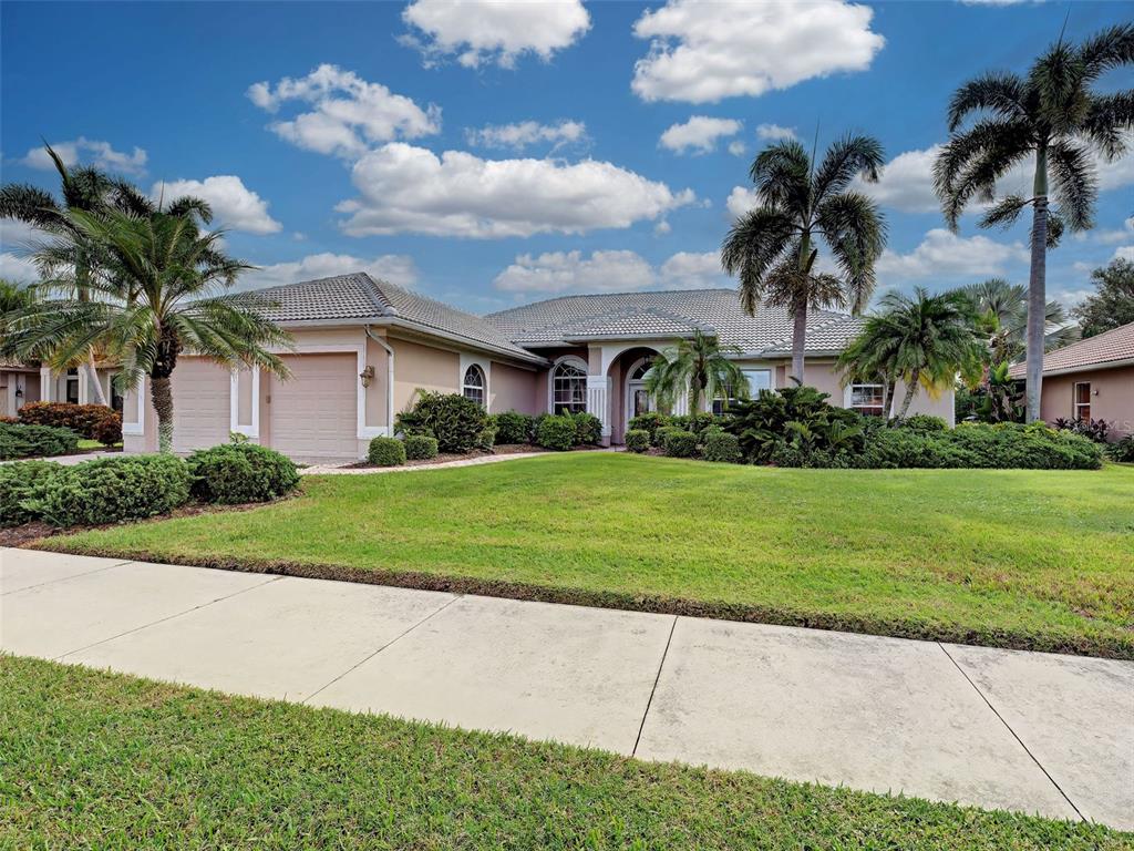 This fabulous home has large NEW TILE ROOF (2025) with transferable warranty, mature, lush landscaping, large lot and is not in a flood zone.
