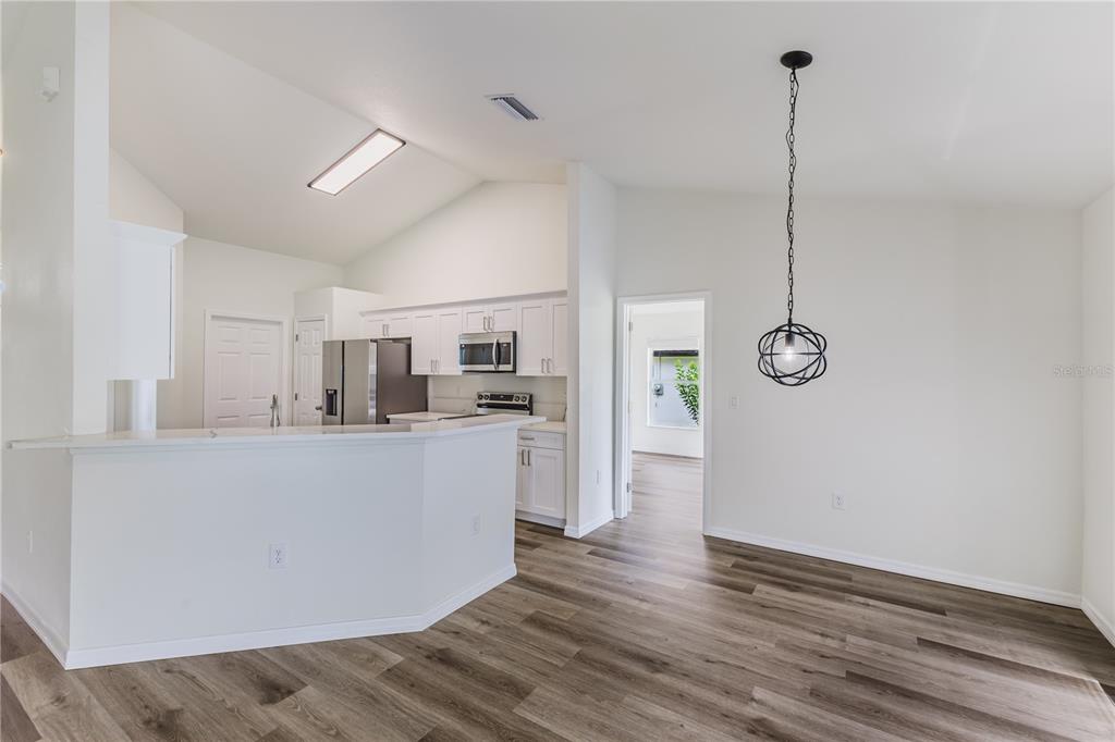 VIEW TO KITCHEN AND DINING