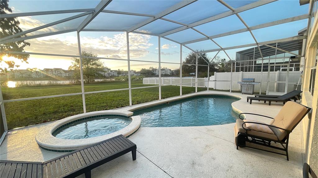 Waterfront pool and hot tub