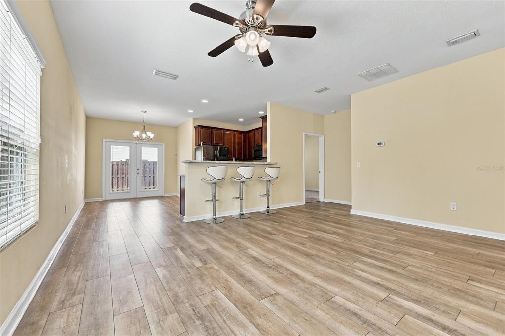Spacious Living, Dining and Kitchen with Bar Counter for Additional Seating