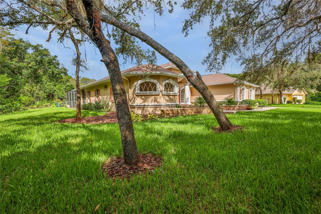 Beautifully landscaped. Over 1.5 acres in gated community.