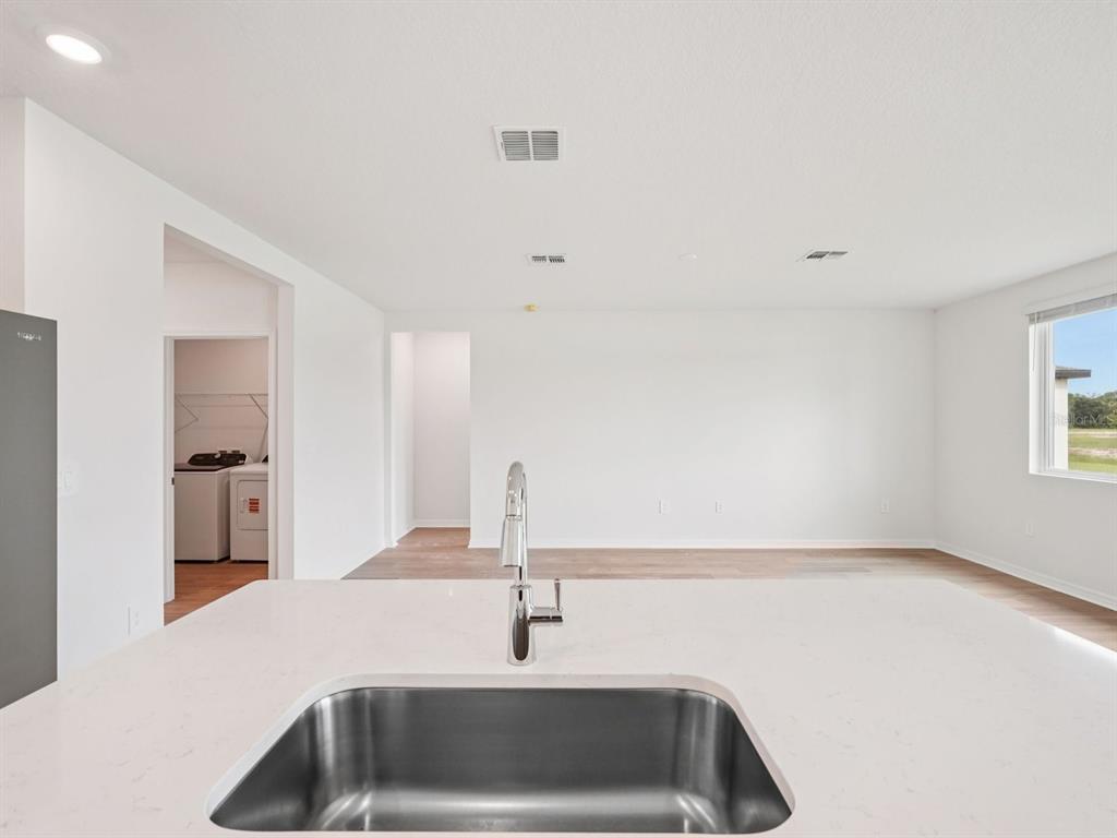 Interior photos are not of the actual home but are photos of the builder home with the same floorplan with similar interior finishes and features.
