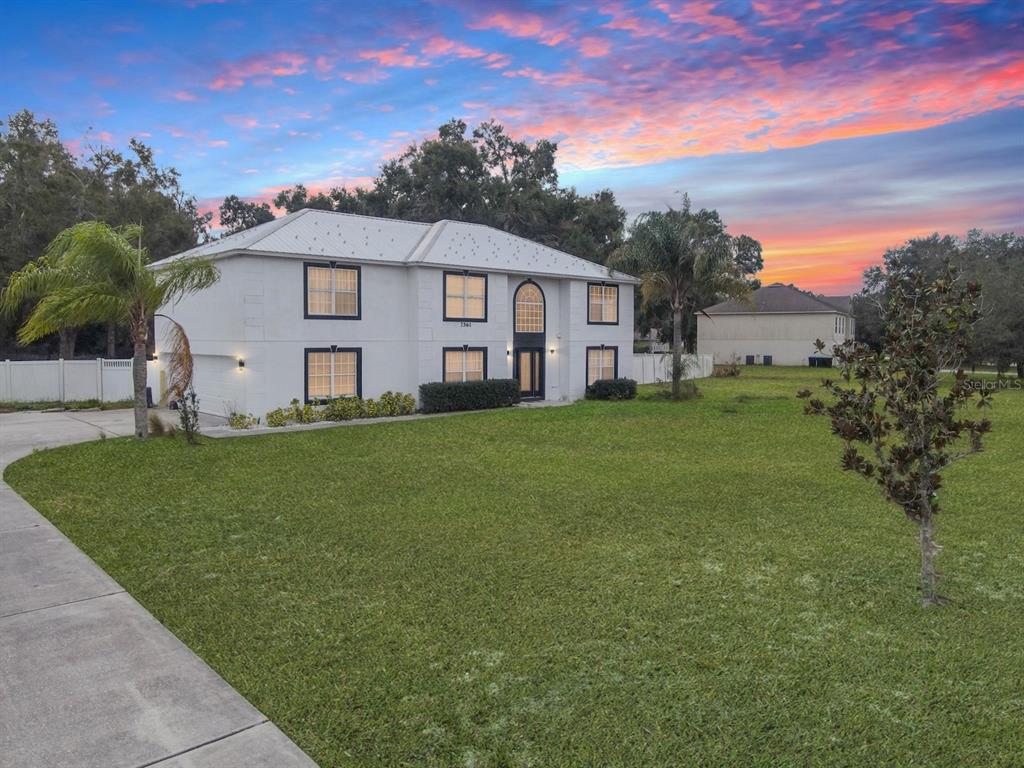 see the homes presence as you pull up in your long driveway and pull up to your 3 car garage