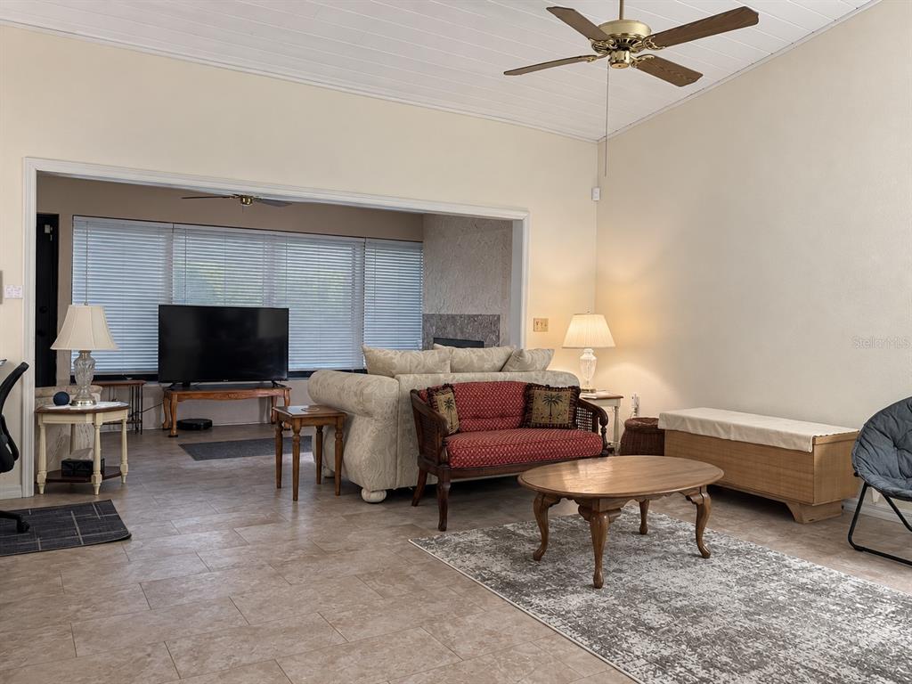 Living room facing Bonusroom and fireplace
