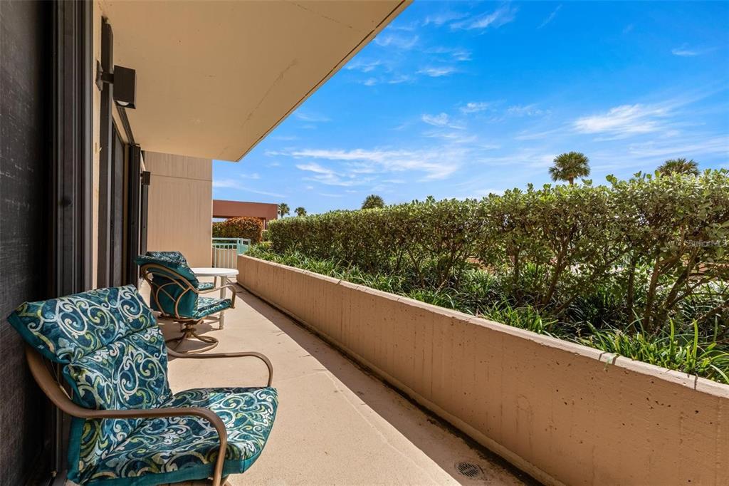An approx 35' LONG Terrace, serving EACH ROOM -on The Sunny Side of Key Capri