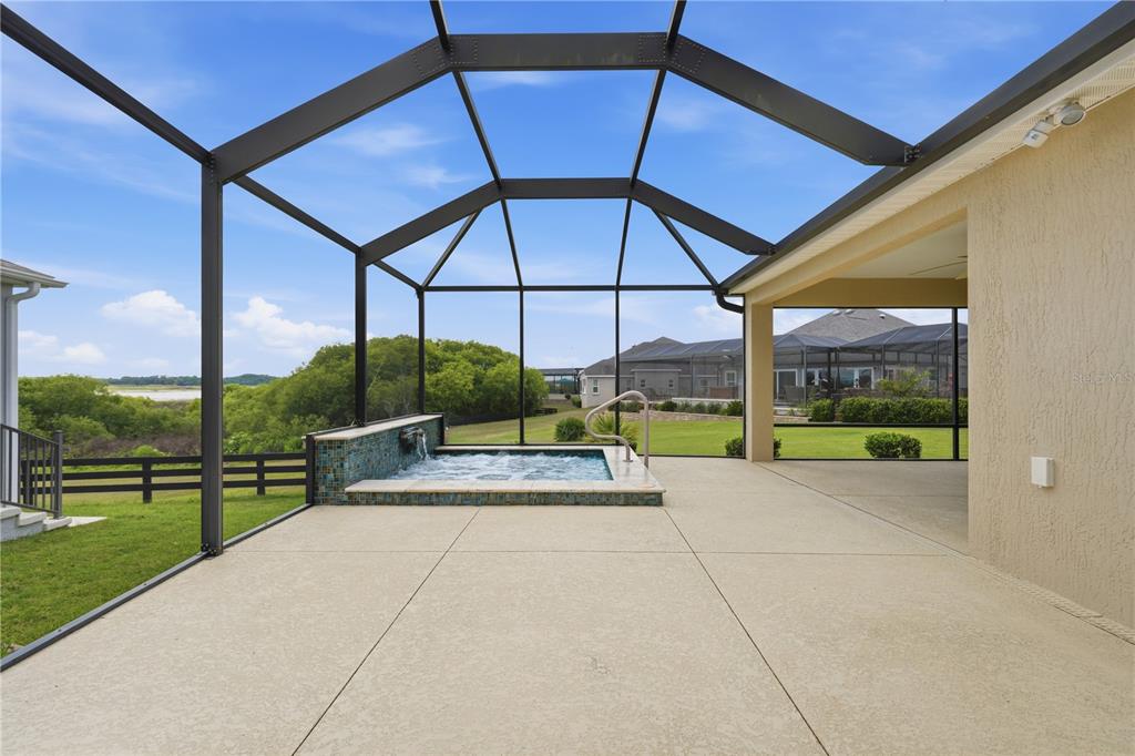 Enjoy a private in-ground spa while relaxing with the lake view