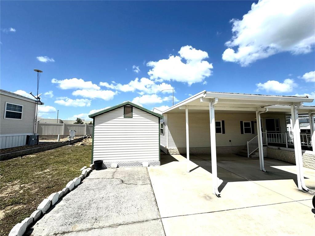 Two lots in Osprey Point Community! Lots of room with a home, shed & tons of parking & space!
