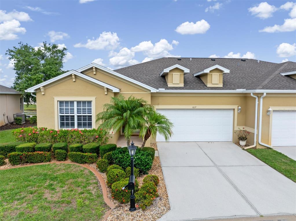 A 2 car garage and newer roof.