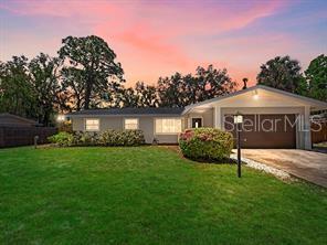 Front elevation at sunset. Digitally enhanced lawn