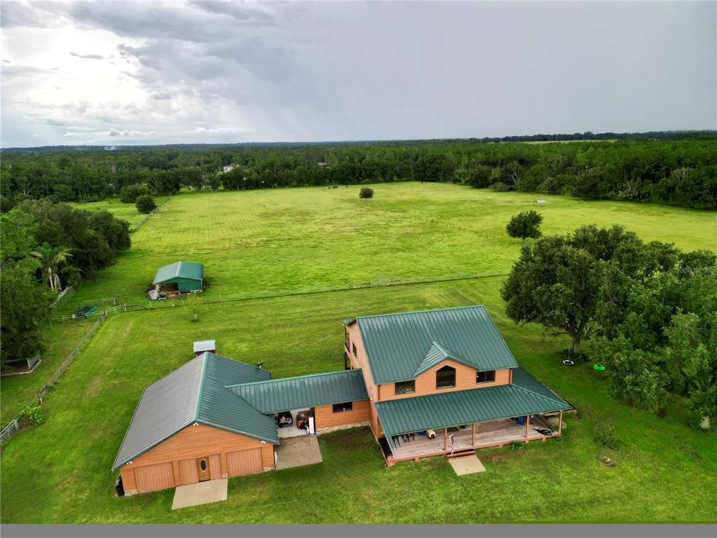 HOUSE, GUESTHOUSE AND 10.16 ACRES