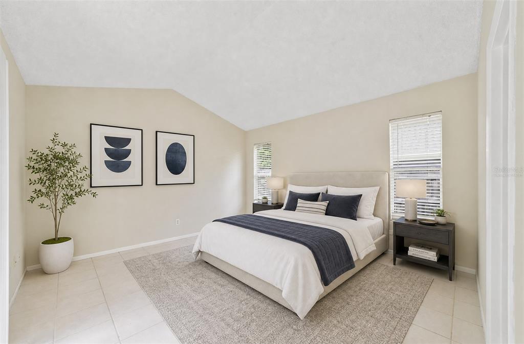 The desirable SPLIT-BEDROOM FLOOR PLAN provides privacy for the Primary Suite, which is tucked away from the secondary bedrooms and features its own DIRECT ACCESS to the back patio and yard. Virtually Staged