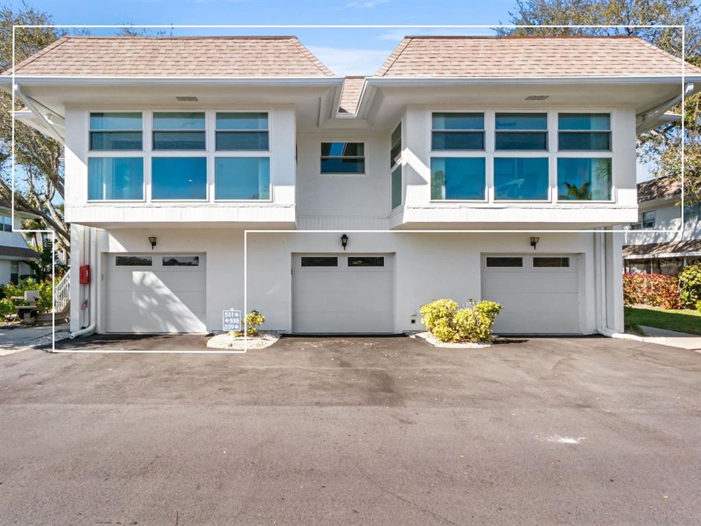 Condo has 2 enclosed balconies and a one car garage.