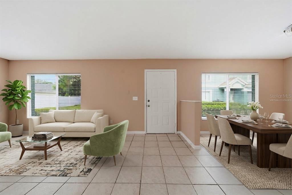 Open Layout family/dining area. Virtually staged