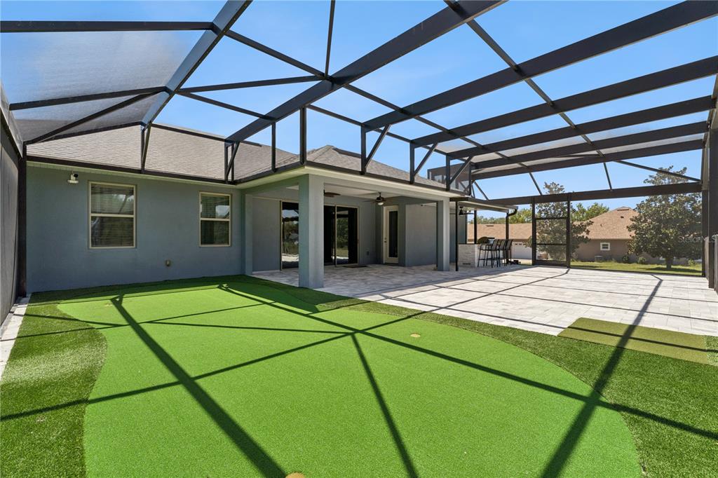 Putting green on pool patio