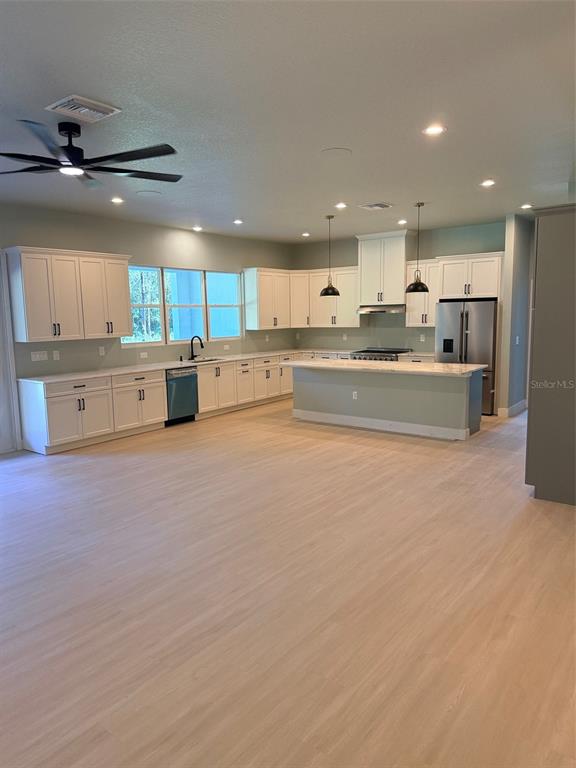 chef style kitchen with 8 foot island