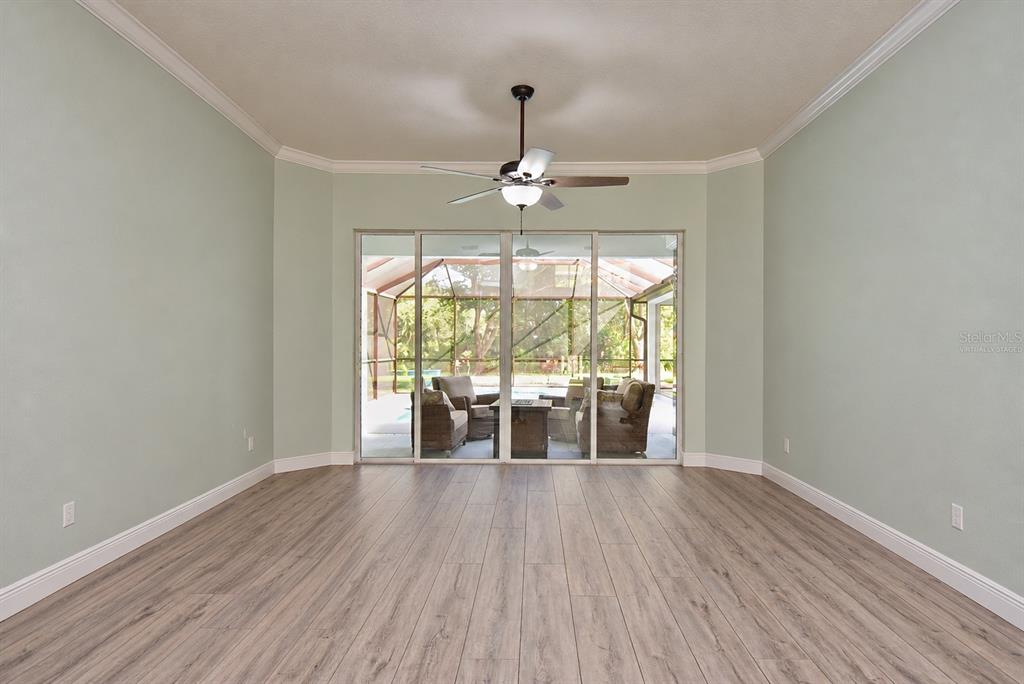 Front living room, virtually staged, gym equipment digitally removed