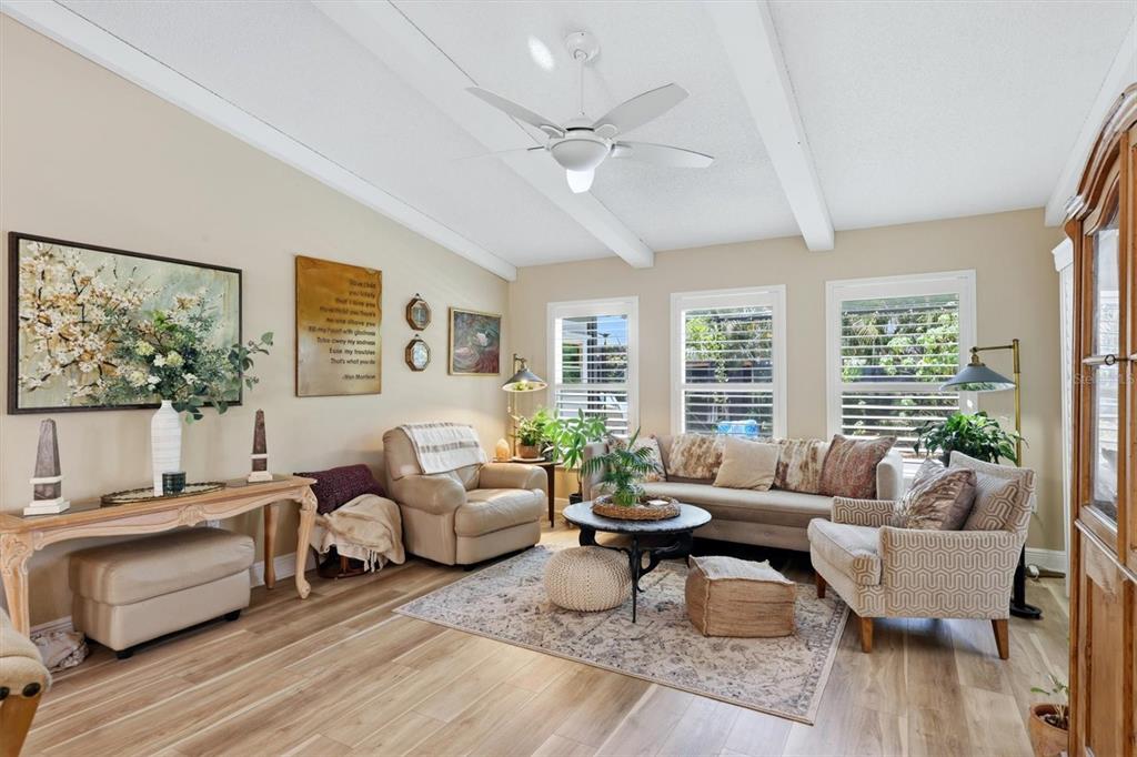 Living room, Luxury vinyl floors, sliding door to cover lanai