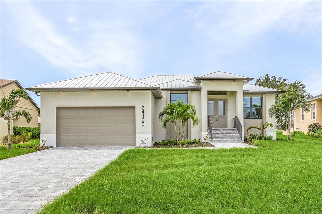 Front view of similarly previous built home.