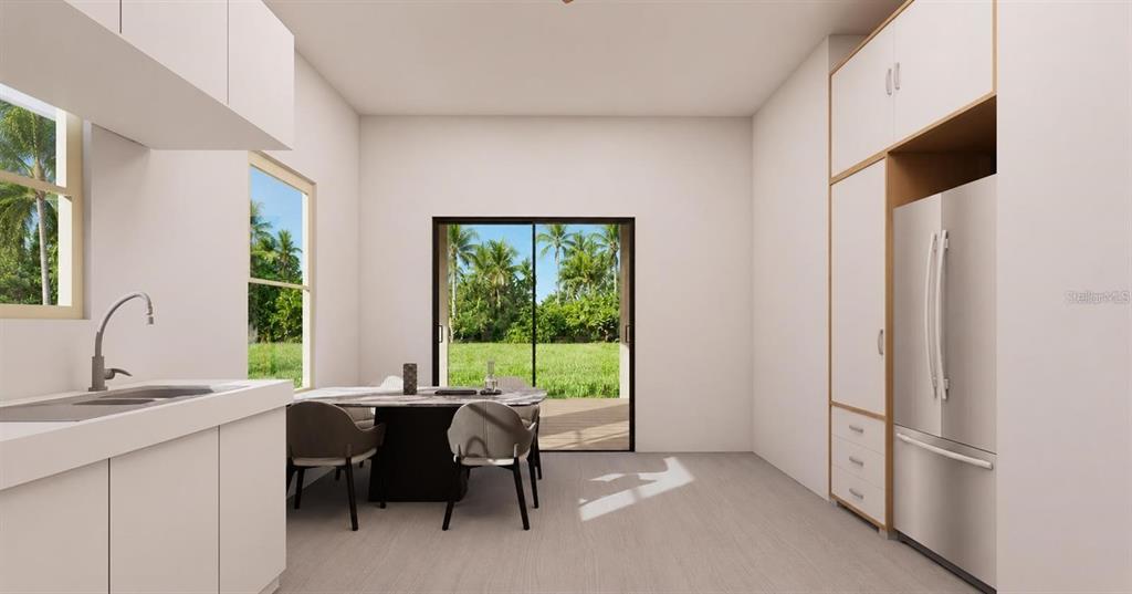 Kitchen to Dining Room with back exterior door